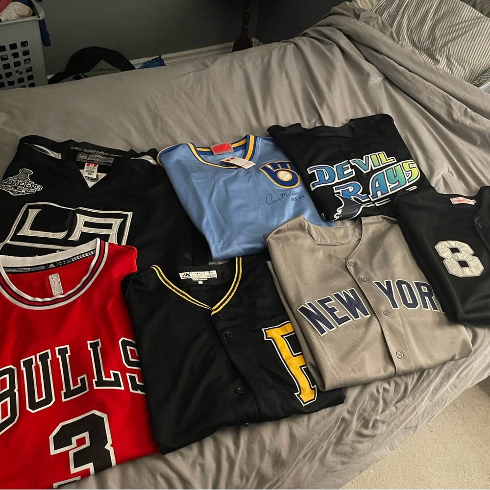 Mixed Sports Jersey Lot - Bulls, Pirates, Yankees, Kings, Rays